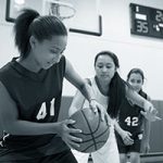 Athletes playing basketball